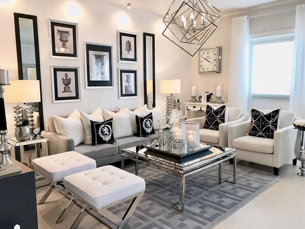 Living room with photo frames on the wall Living room with photo frames on the wall