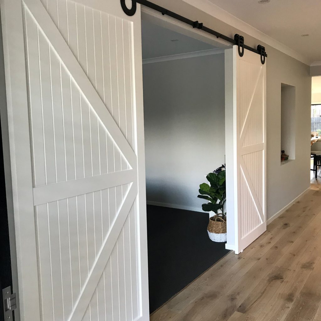 Double Z white bypass barn doors. Double Z white bypass barn doors.