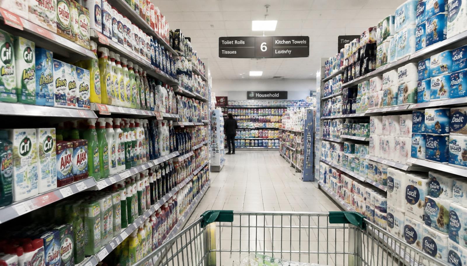 Recession proof stocks 2026, supermarket shelves of everyday consumer staples Recession proof stocks 2026, supermarket shelves of everyday consumer staples