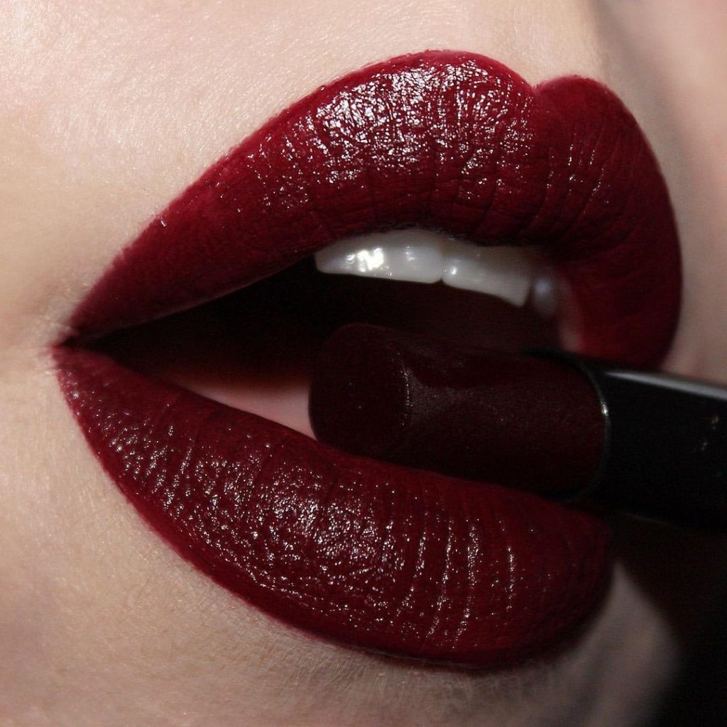 Oxblood berry red of Fortune Teller Forbidden Lipstick