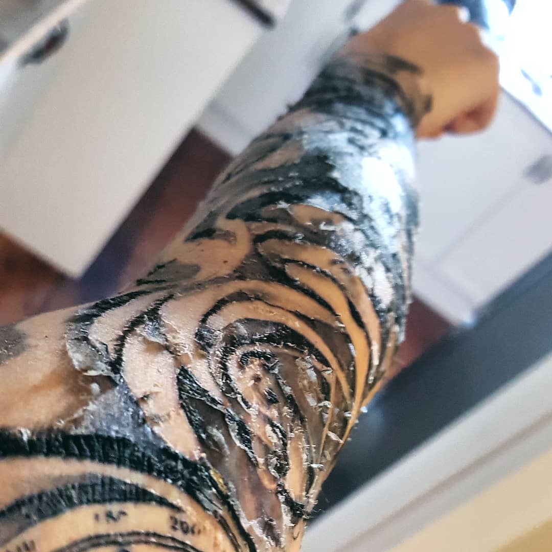 Peeling Tattoos - Do Tattoos Fade When They Peel? - Gazzed