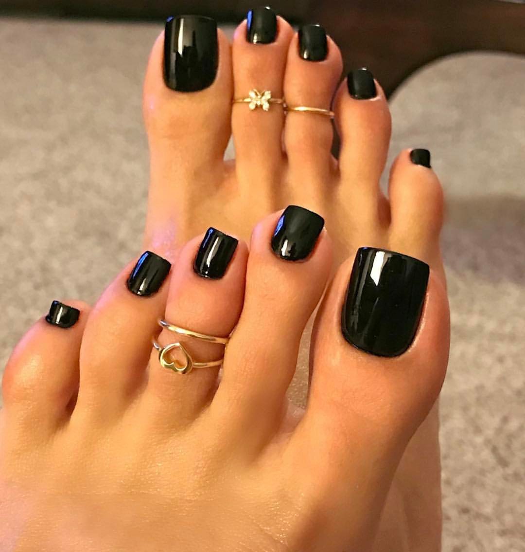 Trust in Black nail design summer and matching toenails.