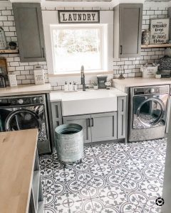 Laundry room with spanish tiles