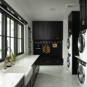 Black Cupboards and with White Marble Laundry Room